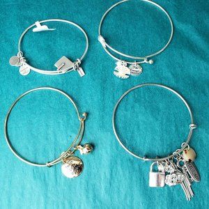 2/15$ Lot of 4 bracelets with charms